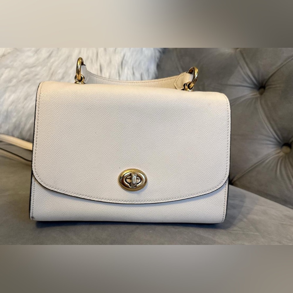 Elegant Cream Handbag with Gold Accents
